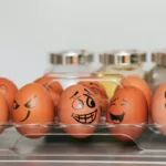 orange and white egg on stainless steel rack